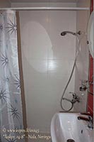Higienos kambaryje dušo kabina